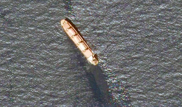 In this satellite image provided by Planet Labs, the Belize-flagged bulk carrier Rubymar is seen in the southern Red Sea near the Bab El-Mandeb Strait leaking oil after an attack by Yemen's Houthi rebels. — Planet Labs PBC/AP