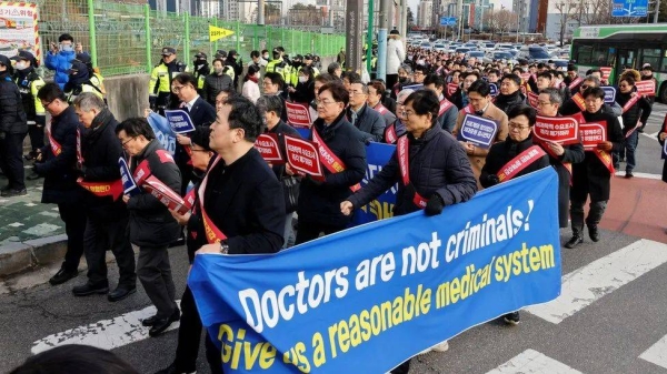 South Korean doctors protest against the government's medical policy in front of the Presidential office in Seoul