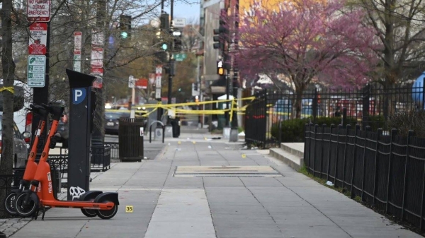 Tape marks the scene of a shooting in Washington, DC, on Sunday