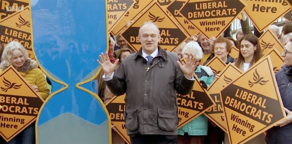 Lib Dems' Sir Ed Davey launches his party's local election campaign with their latest stunt graphic poking fun at the government.