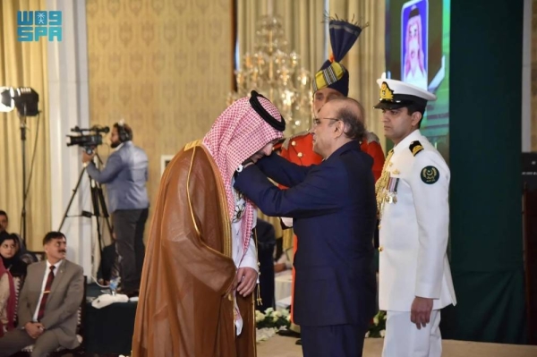 Pakistan’s President Asif Ali Zardari decorates Sultan Al-Marshad, CEO of the Saudi Fund for Development, with the ‘Hilal-i-Quaid-i-Azam’ medal in a ceremony held in Islamabad.