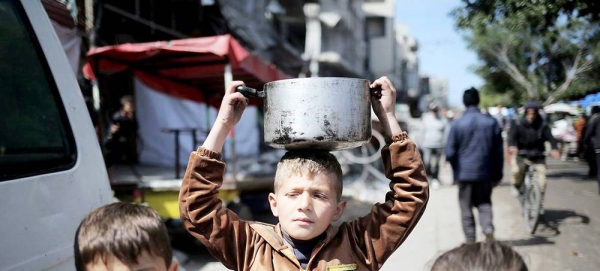 Children walk through the streets of Rafah in southern Gaza. — courtesy UNICEF/Eyad El Baba