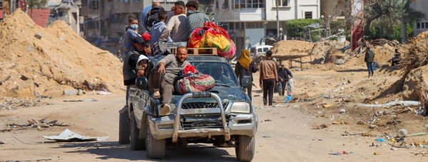 A vehicle is driven through the destruction in Khan Younis. — courtesy UNOCHA/Themba Linden