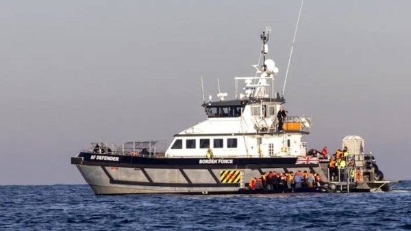 A small boat is rescued in English waters by Border Force. — courtesy Getty Images