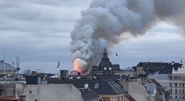 Fire engulfs the historic spire at the Copenhagen stock exchange