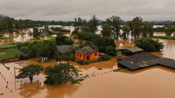 Muddy waters have flood farmland and roads in many parts of the Brazilian state of Rio Grande do Sul, where thousands of people have been affected