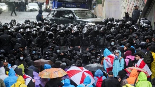 Tens of thousands of people have taken to the streets of Tbilisi ahead of the bill's final reading