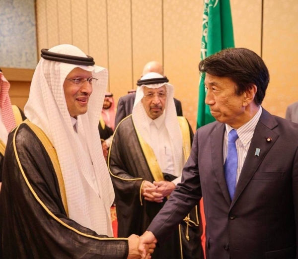 Japanese Minister of Industry Ken Saito receives Saudi Minister of Energy Prince Abdulaziz bin Salman in Tokyo on Tuesday.
