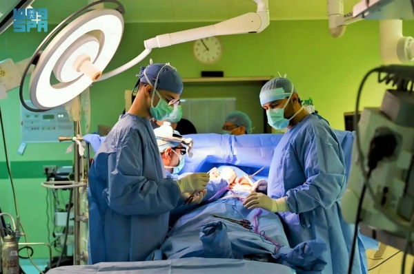 The medical team performs open-heart surgery on Indonesian Hajj pilgrim at Madinah Cardiac Center.

