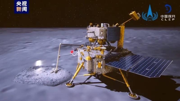 Screengrab of video published by China's space agency depicting the robot craft pulling out a Chinese flag and waving it up and down on the moon surface