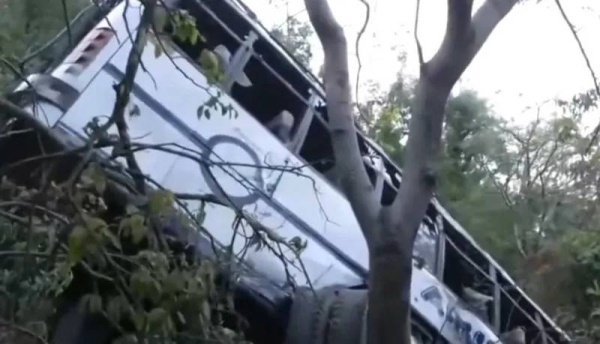 Police say the driver lost control after the bus was fired upon