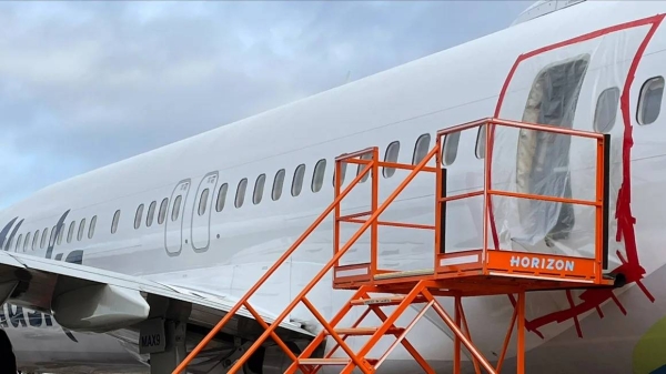 This photo from the National Transportation Safety Board shows the exterior of the fuselage plug area of Alaska Airlines Flight 1282 Boeing 737-9 Max