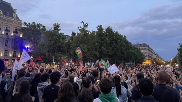 Protesters gather after the French election results in the first round of the legislative elections