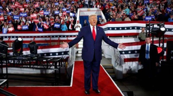 Donald Trump greets a crowd during his campaign