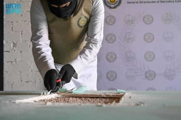 The General Directorate of Narcotics Control officials, in coordination with the Zakat, Tax and Customs Authority, seized 11,934,000 amphetamine pills, hidden inside a container of gypsum board building materials at Jeddah Islamic Port.