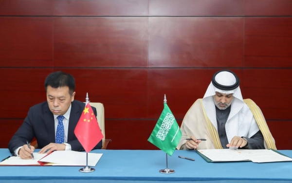 Saudi and Chinese health ministers sign the agreement in Beijing on Thursday.