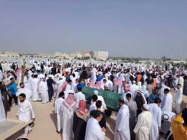 Large number of people attend the burial of those who died in the fire in Hofuf.