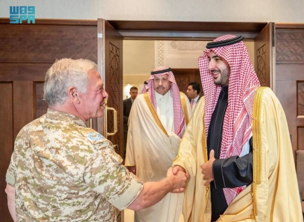 King Abdullah II of Jordan receives Saudi Minister of Defense Prince Khalid bin Salman at Al-Husseiniya Palace in Amman on Sunday.
