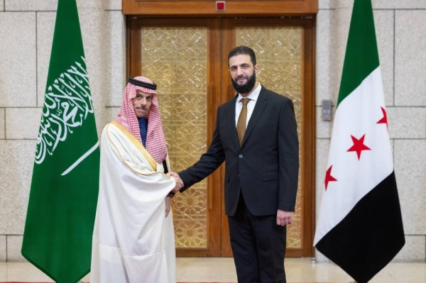 Syrian leader Ahmed Al-Sharaa receives Saudi Arabia’s Foreign Minister Prince Faisal bin Farhan at the People’s Palace in Damascus on Thursday.