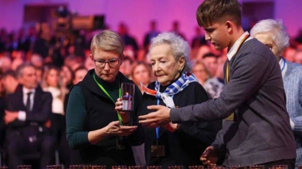 Survivor Niusia Horowitz-Karakulska (C), who was sent to Birkenau in 1944, was among the 56 camp survivors attending the ceremony