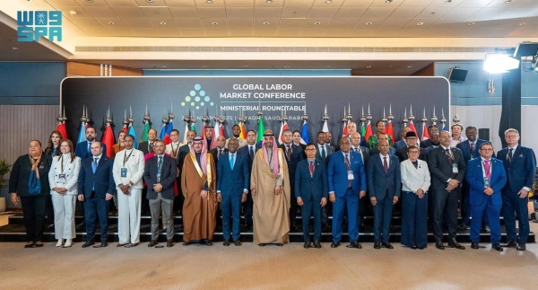 Minister of Human Resources and Social Development Ahmed Al-Rajhi poses for a group photo with labor ministers after chairing their roundtable meeting at the second Global Labor Market Conference in Riyadh on Wednesday.
