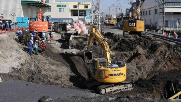 The sinkhole in Yashio city is believed to be caused by a sewer rupture