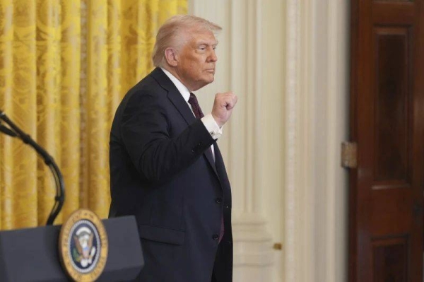 President Donald Trump gestures as he departs a reception celebrating Greek Independence Day in the East Room of the White House, Monday, March 24, 2025, in Washingto