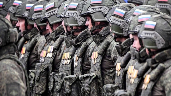 Russian servicemen march on Red Square during the Victory Day military parade in 2024