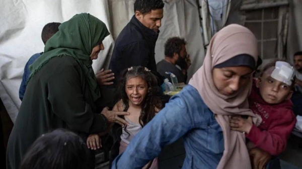 Casualties from the air strikes in Gaza City, including children, were brought to al-Ahli hospital
