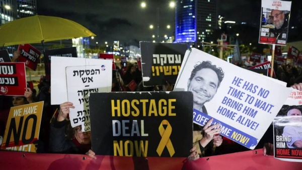 Israeli protesters demand the immediate release of the hostages held in the Gaza Strip by the Hamas militant group at a protest in Tel Aviv, 1 February 2024