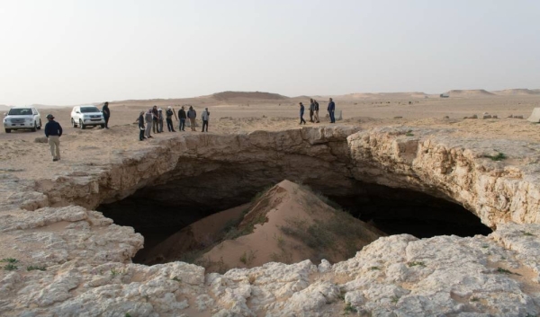 The scientific team from inside Duhool Al-Samman northeast of Riyadh documents discoveries that reveal the natural transformations the region has undergone over millions of years.