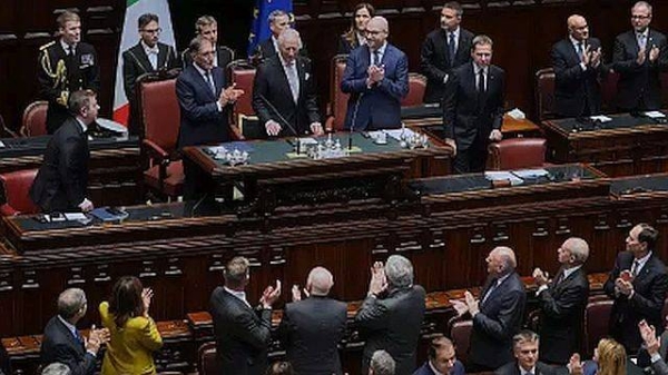 King Charles III is welcomed by members of the Italian government inside the Italian parliament in Rome, 9 April 2025
