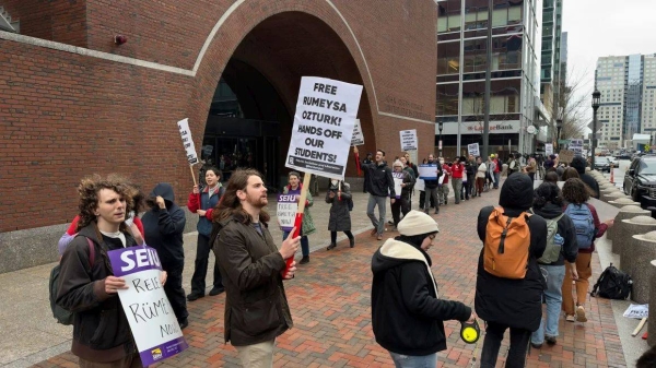 Protesters gather outside federal court during a hearing on April 3 with lawyers for Rumeysa Ozturk, a Tufts University doctoral student from Turkey who was detained by immigration authorities