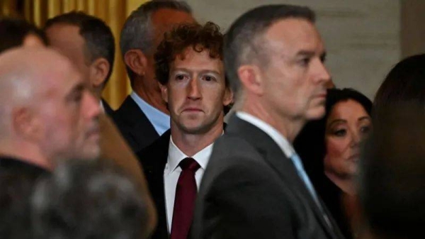 Mark Zuckerberg stands among a crowd at President Donald Trump's inauguration in January