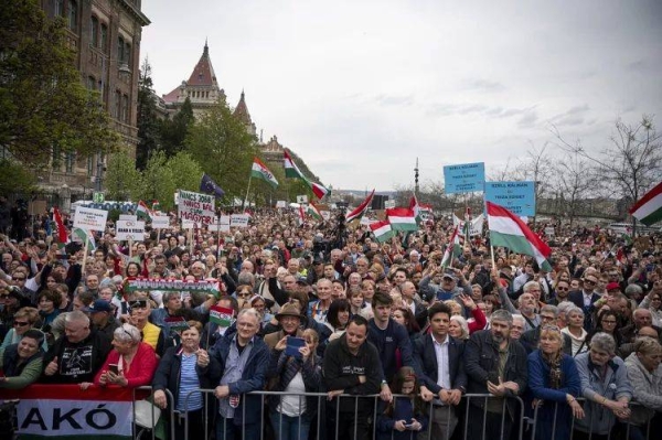 Supporters attend a rally for the Hungarian opposition Tisza Party before the results of the party's public survey, Budapest, Hungary, Sunday, April 13, 2025