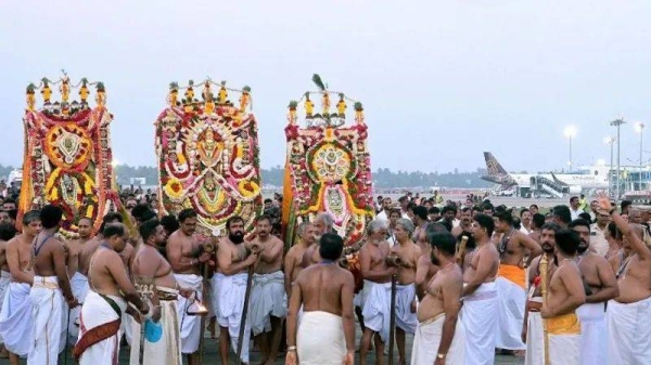 The procession has been passing through the airport since it was built in 1932