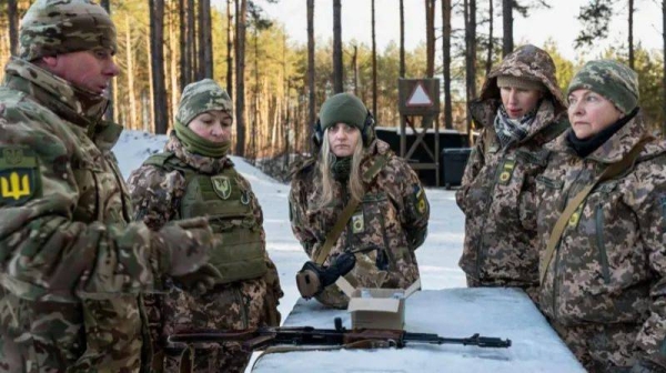 A group of female volunteer soldiers undergo tactical shooting training in Bucha