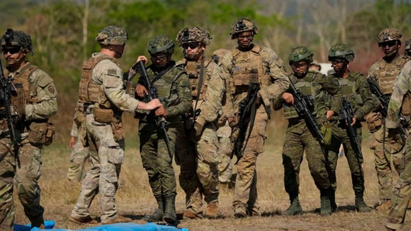 Filipino and US soldiers participate during a joint military drill called Salaknib at Fort Magsaysay, Nueva Ecija province, northern Philippines on 31 March 2025