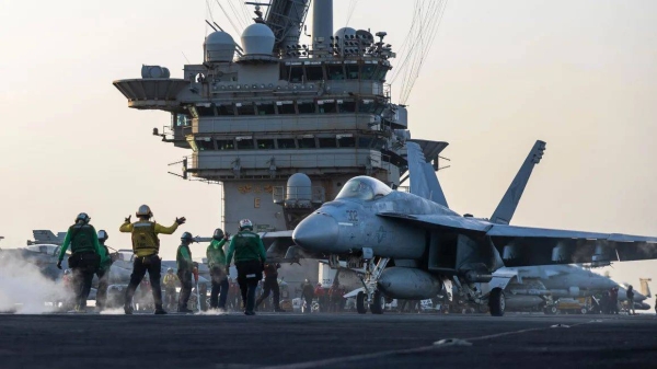 This April 1 photo from the US Navy shows a FA-18E Super Hornet preparing for launch on the USS Harry S. Truman