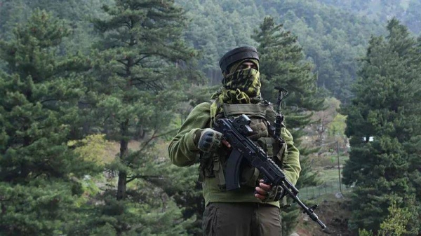 An Indian paramilitary serviceman keeps watch in Pahalgam, Indian-administered Kashmir, where militants killed 26 tourists last week