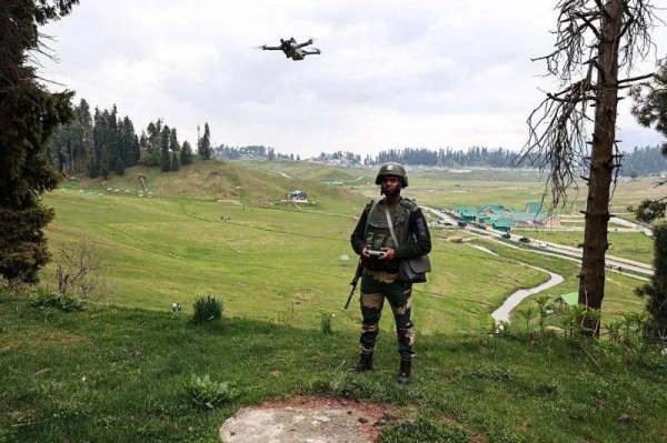 An Indian soldier operates a surveillance drone amid heightened tensions in Jammu and Kashmir
