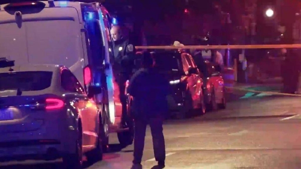 In this image taken from video provided by WJLA, law enforcement works the scene after two staff members of the Israeli embassy in Washington were shot and killed