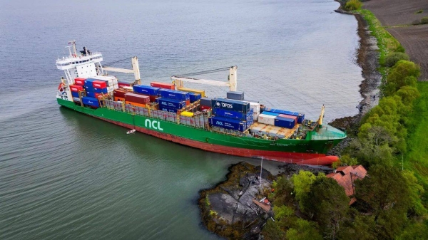 This aerial view shows the 443-foot NCL Salten grounded in the Trondheim Fjord, Norway on Thursday, May 22