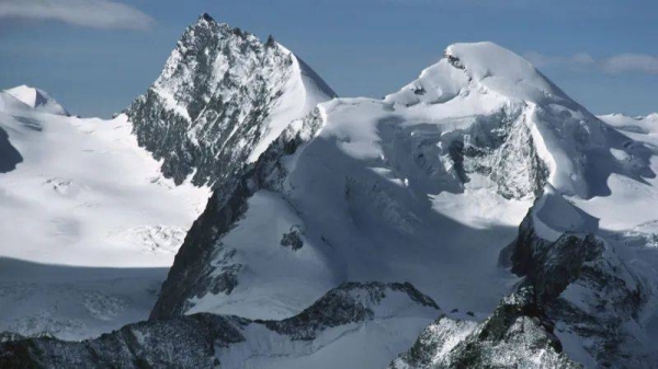 The snow-capped peaks of Rimpfischhorn (left) and Allalinhorn in the Valais Alps