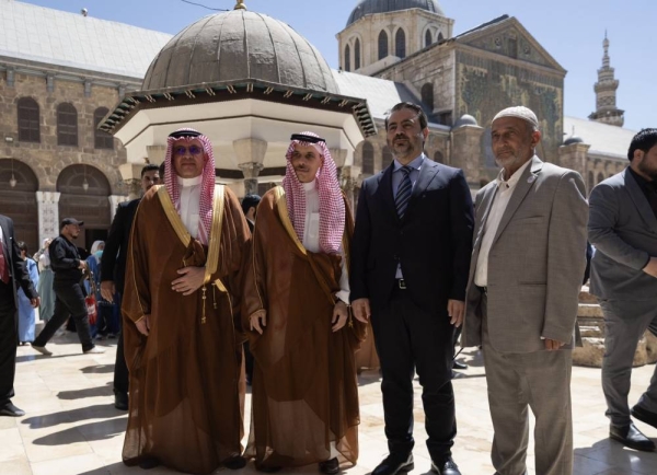 Saudi Foreign Minister Prince Faisal bin Farhan visits the Umayyad Mosque accompanied by Syrian Foreign Minister Assad Al-Shibani on Saturday. 