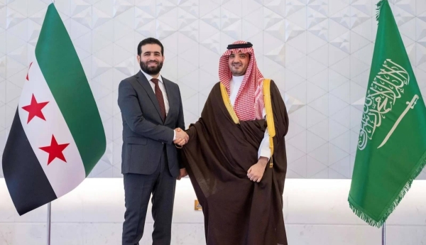 Saudi Minister of Interior Prince Abdulaziz bin Saud bin Naif receives his Syrian counterpart Anas Khattab in Jeddah on Monday.
