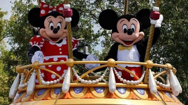 Mickey Mouse and Minnie Mouse on a float during the daily Festival of Fantasy Parade at Walt Disney World on 3 April, 2025, in Orlando, Florida