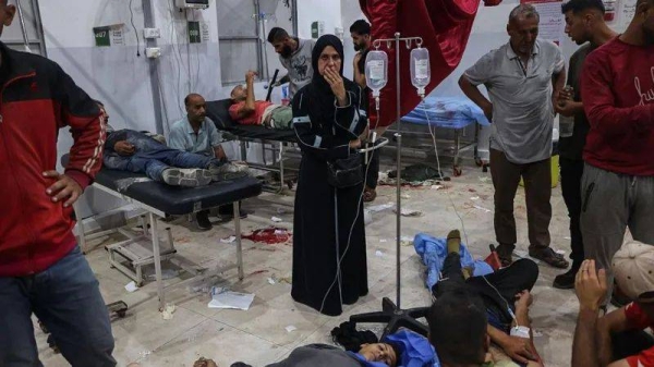 There were chaotic scenes as men with gunshot wounds were brought to al-Awda hospital in Nuseirat