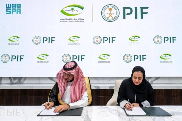 Senior officials of Oversight and Anti-Corruption Authority (Nazaha) and the Public Investment Fund (PIF) sign a memorandum of understanding in Riyadh on Tuesday.
