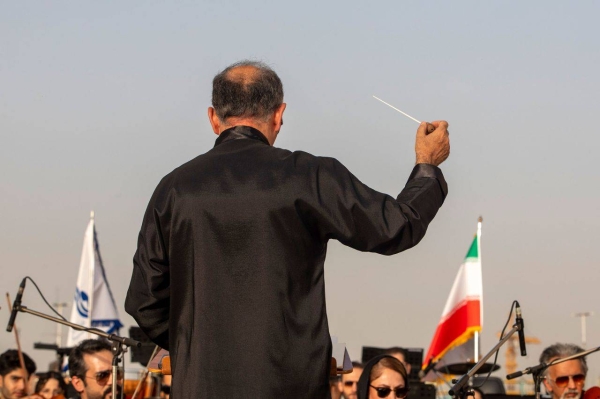 The Tehran Symphony Orchestra perform five pieces in Tehran's Azadi Square on Wednesday.The Tehran Symphony Orchestra perform five pieces in Tehran's Azadi Square on Wednesday